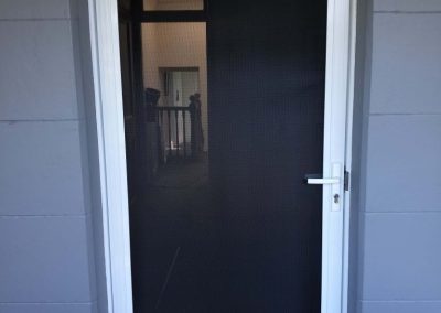 Hinged-door-Heavy-duty-extruded-aluminium-frame-Powder-Coated-white-finish-DVA-one-way-black-mesh-Pet-door-768x1024